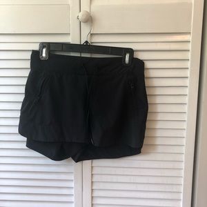 Athleta black shorts size 4 zippered pockets